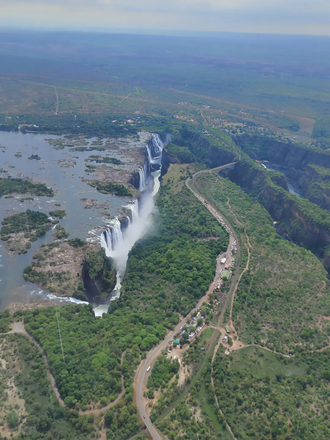 Victoria Falls from the air, the river dropping into the gorge below